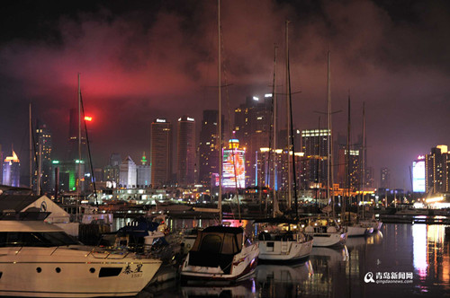 China's sailing city lights up at night