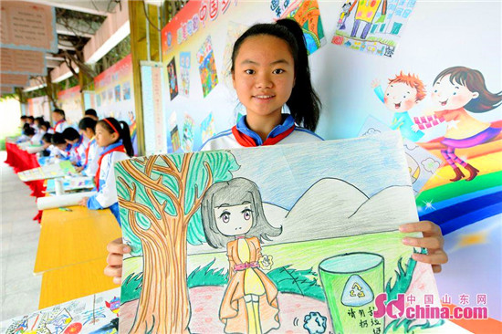 Qingdao pupils use bright colors to paint the country's future