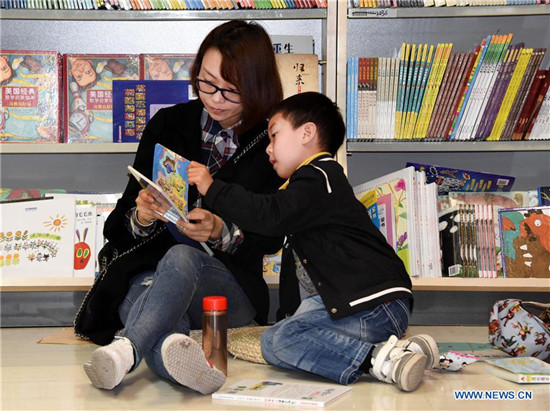 Family reading promoted to greet World Book Day in Qingdao